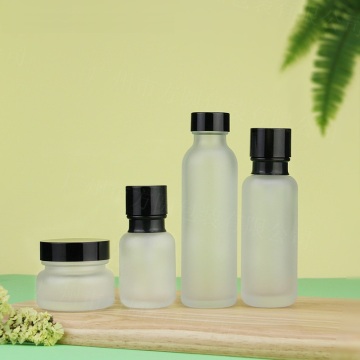 Cosmetic Frosted glass bottle with black caps