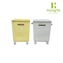 Yellow and white folding baskets with wheels