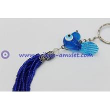 Translucent blue bird evil eye keychain
