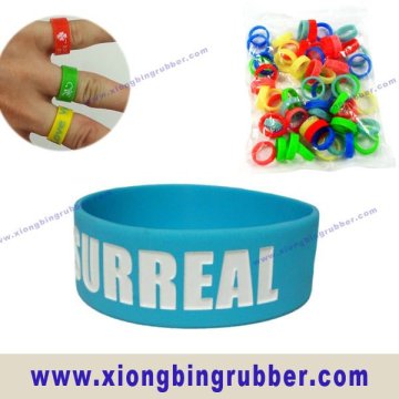 Embossed silicone finger ring