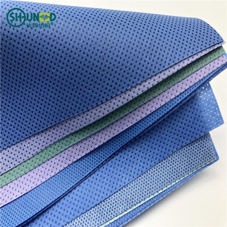 Stock SSMMS, SMS ,SMMS Meltblown Nonwoven Fabric Light Blue 28 Tons 100% Polypropylene Oeko-tex 100% STANDARD Blue and White DOT