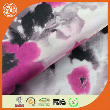 Bright shiny smooth floral satin fabric