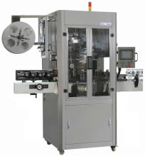 AUTOMATIC SLEEVE LABELLING MACHINE