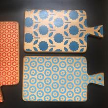Different coloured chopping boards