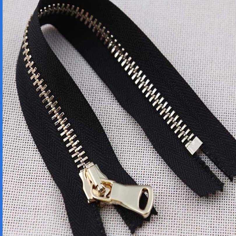 Open ended brass zipper