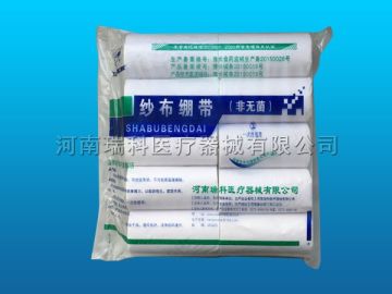 Disposable white medical gauze bandage