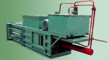 Waste metal baler