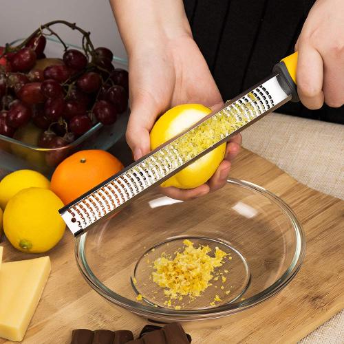 Zester de citron pour le gingembre, l&#39;ail, le chocolat, les légumes, les fruits