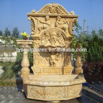 Beautiful stone hand carved human nude little angel wall fountain