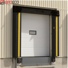 Sectional industrial glass door with dock shelter and dock lever