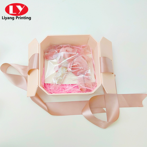 Pink octagonal double open gift box with ribbon