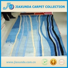 Home use washable handtufted cheap fashion pattern design blue area rug for living room                        
                                                                                Supplier's Choice