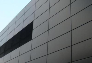 Fluorocarbon coated thin precision steel plate