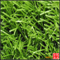 Grama artificial do gramado da grama plástica à terra do esporte
