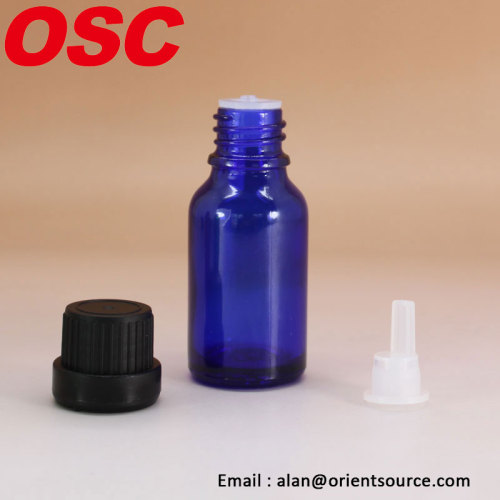 Garrafa de óleo essencial de vidro cobalto de cor azul com tampa evidente