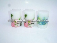 white printed cylindrical candles