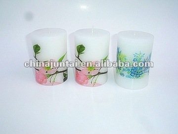 white printed cylindrical candles