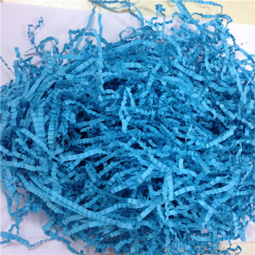 blue crimped paper candy package fillers