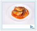 Huile de jus de tomate et de sardine en conserve