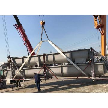 Convoyeur à vis de sortie de silo pour fibres de papier