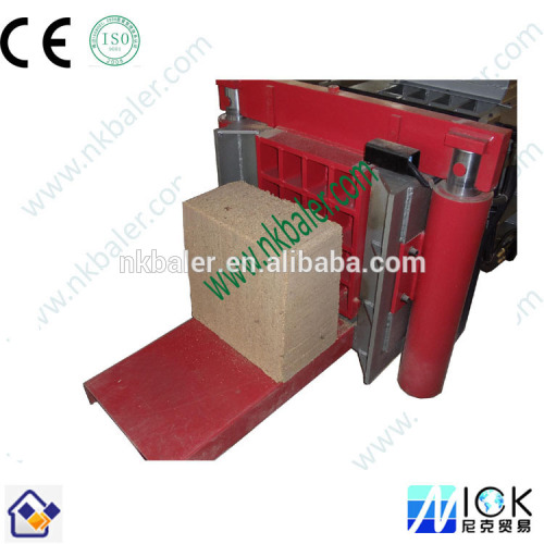 Sawdust briquette compactor