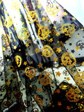 Foil tulle mesh fabric with a printed design