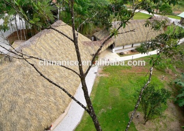 palapa structure with custom Mexican rain cape thatch panels