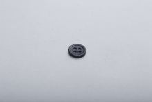 Shell buttons are used in knitted sweaters
