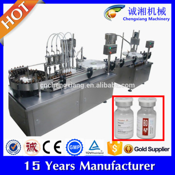 Pharmaceutical vial filling and capping machine