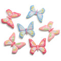 Venta caliente 100 unids / lote resina de mariposa cabujón de espalda plana Kawaii adorno de mariposa para Scrapbooking lazos para el cabello artesanía