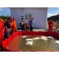 Temporary water tank flood barrier for fire rescue