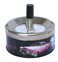 Round tin ashtray