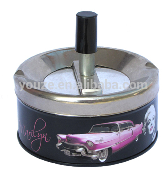 Round tin ashtray