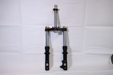 Efficient Shock Absorber for Electric Tricycle Stability