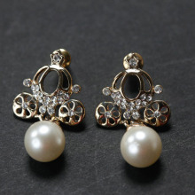 Friendly large pearl drop earring with CZ diamond