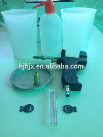 Portable inner mix spray gun