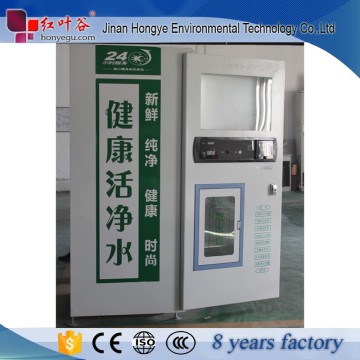 Automatic water vending machine with coin operated system