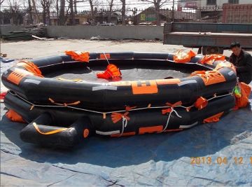 Both sides of reversible inflatable life raft with cradle for inland river