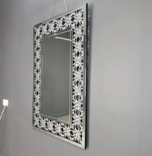 Decorative mirror hanging on the wall