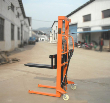 Hand pull stacking machine