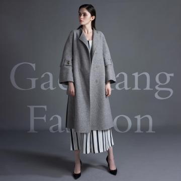 Large pocket double belt style overcoat