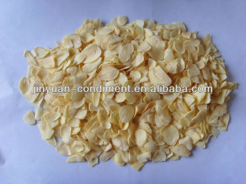 Grade A white dehydrated garlic flakes