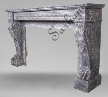Fireplace  with lion's paws,  made out of Bleu Tigre marble