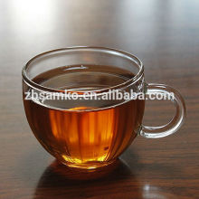 Small handblown glass tea cup with handle