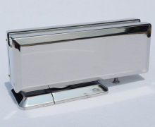 Self-closing floor spring for shower door