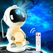 A galaxy projector with moonlight and remote control