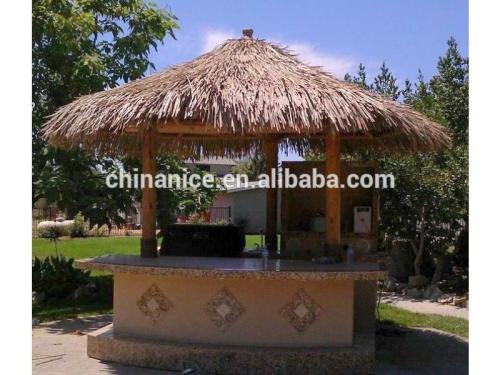 Palapa house roof Covering a BBQ Island with cheap artificial grass