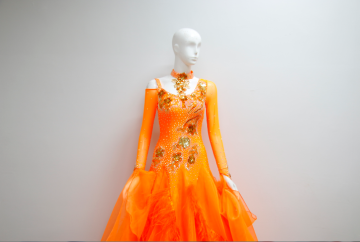 Orange ballroom dance costumes for ladies