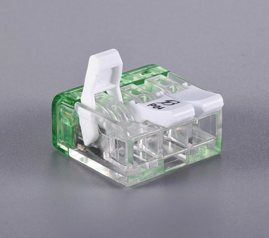 Push wire connector in plastic housing