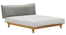 A soft-backed solid wood bed made of simple wood
